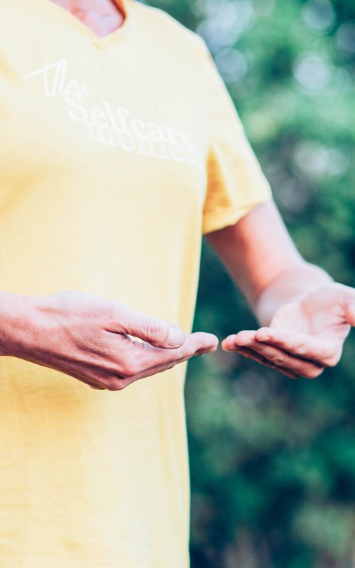 woman doing qi gong outdoors